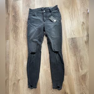 Women’s Black distressed jeans size 9.